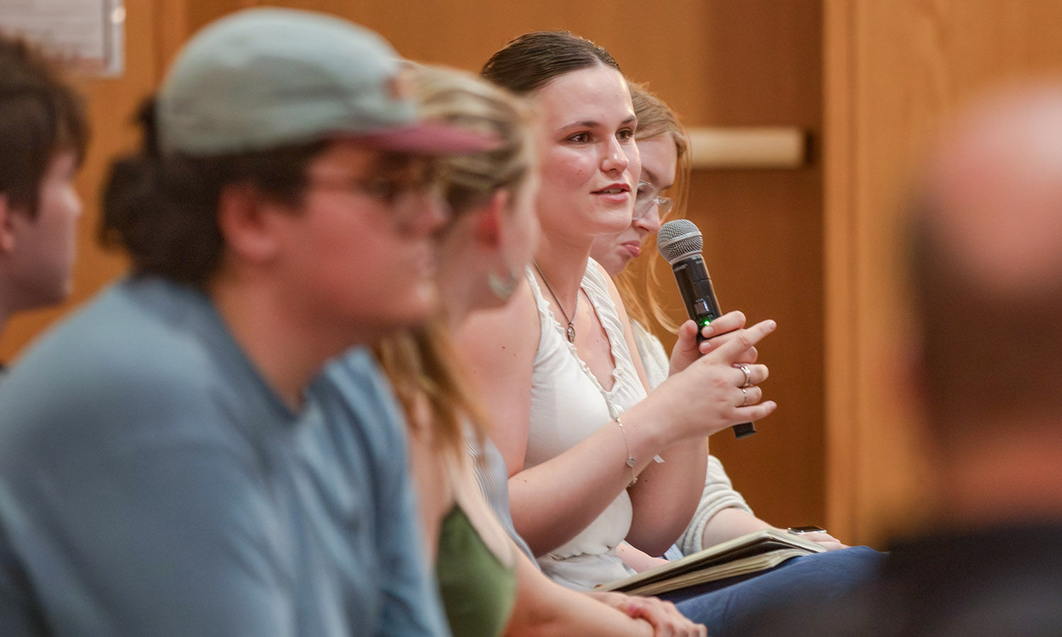 Audience members include students, faculty and community guests.
