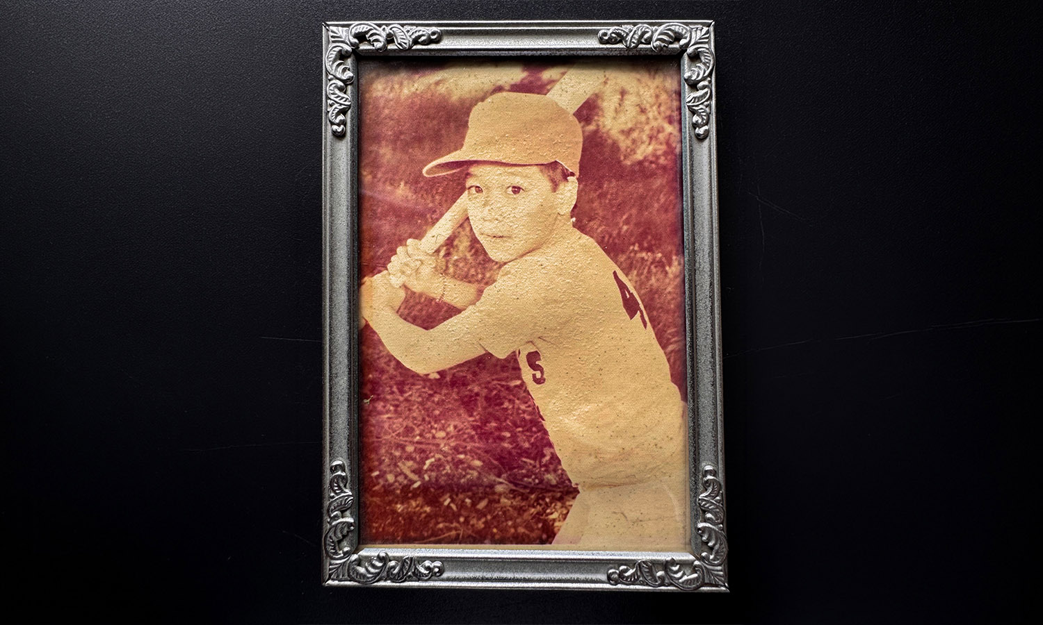 Childhood baseball photo.