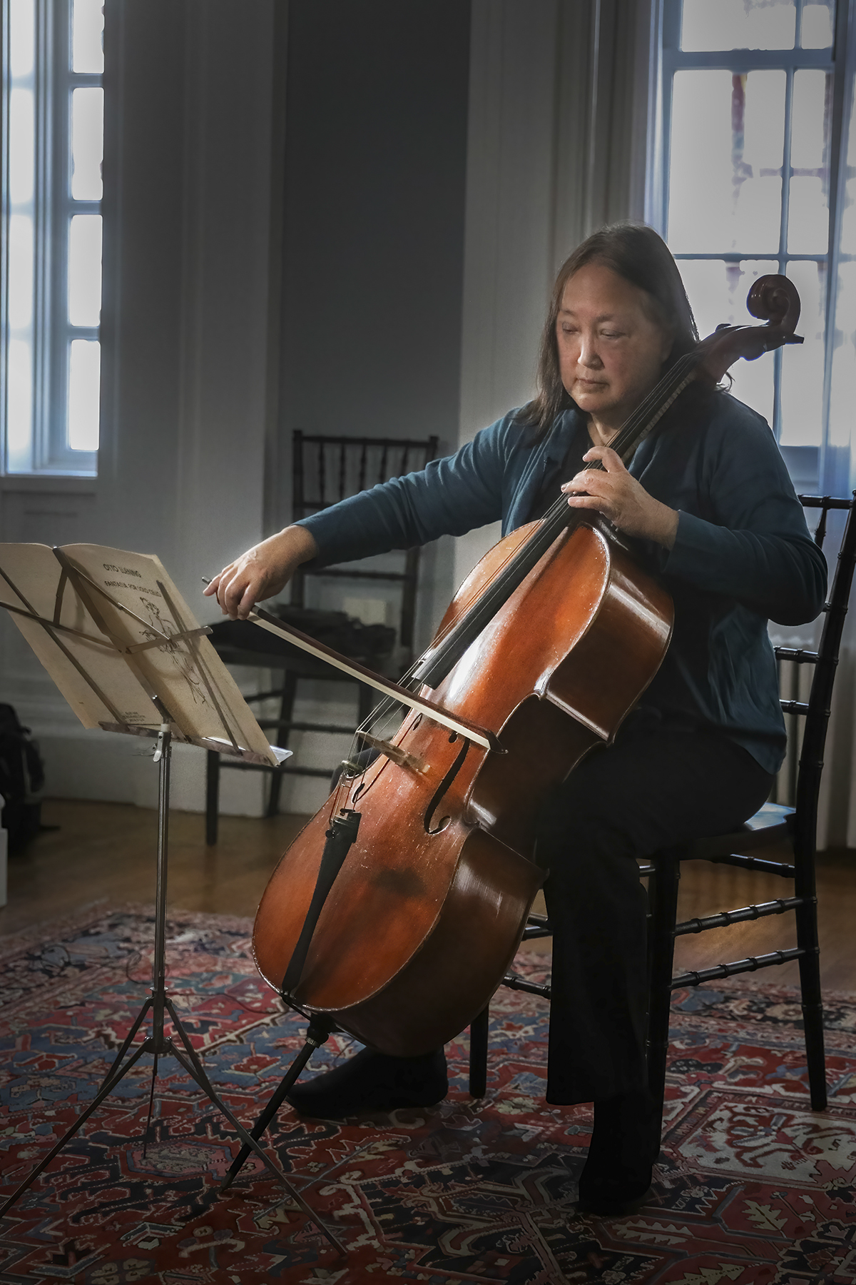 President Joyce Jacobsen Playing Cello