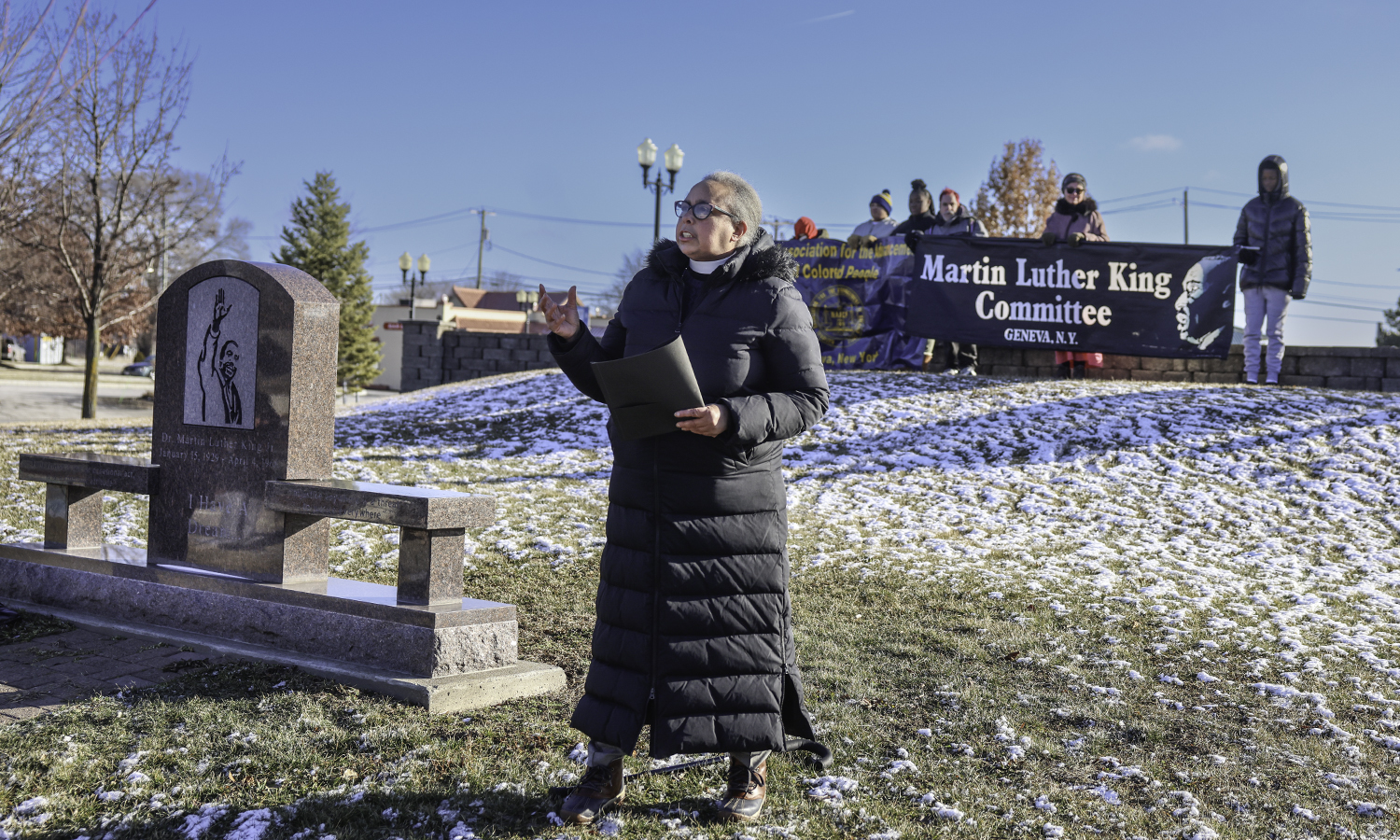 Dean of Spiritual Engagement and Chaplain, The Rev. Nita C. Johnson Byrd addresses marchers at the MLK Memorial in Geneva, N.Y. 