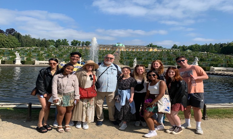 Group photo in front of fountain