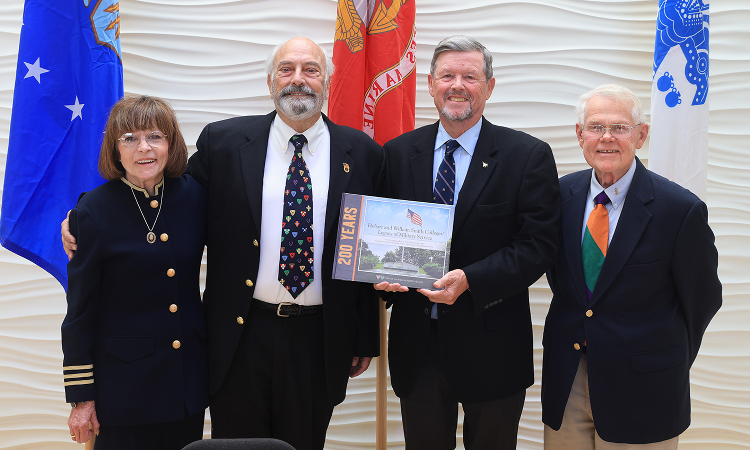  Col. Katherine Platoni ’74, Lt. General John "Jack" Woodward ’68, Col. C.R. Anderegg ’67 and Lt. Col. John Norvell ’66, P’99, P’02 gather for a photo