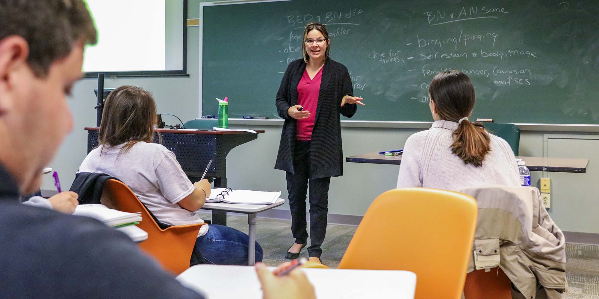 Prof. Jamie Bodenlos teaches in the classroom.
