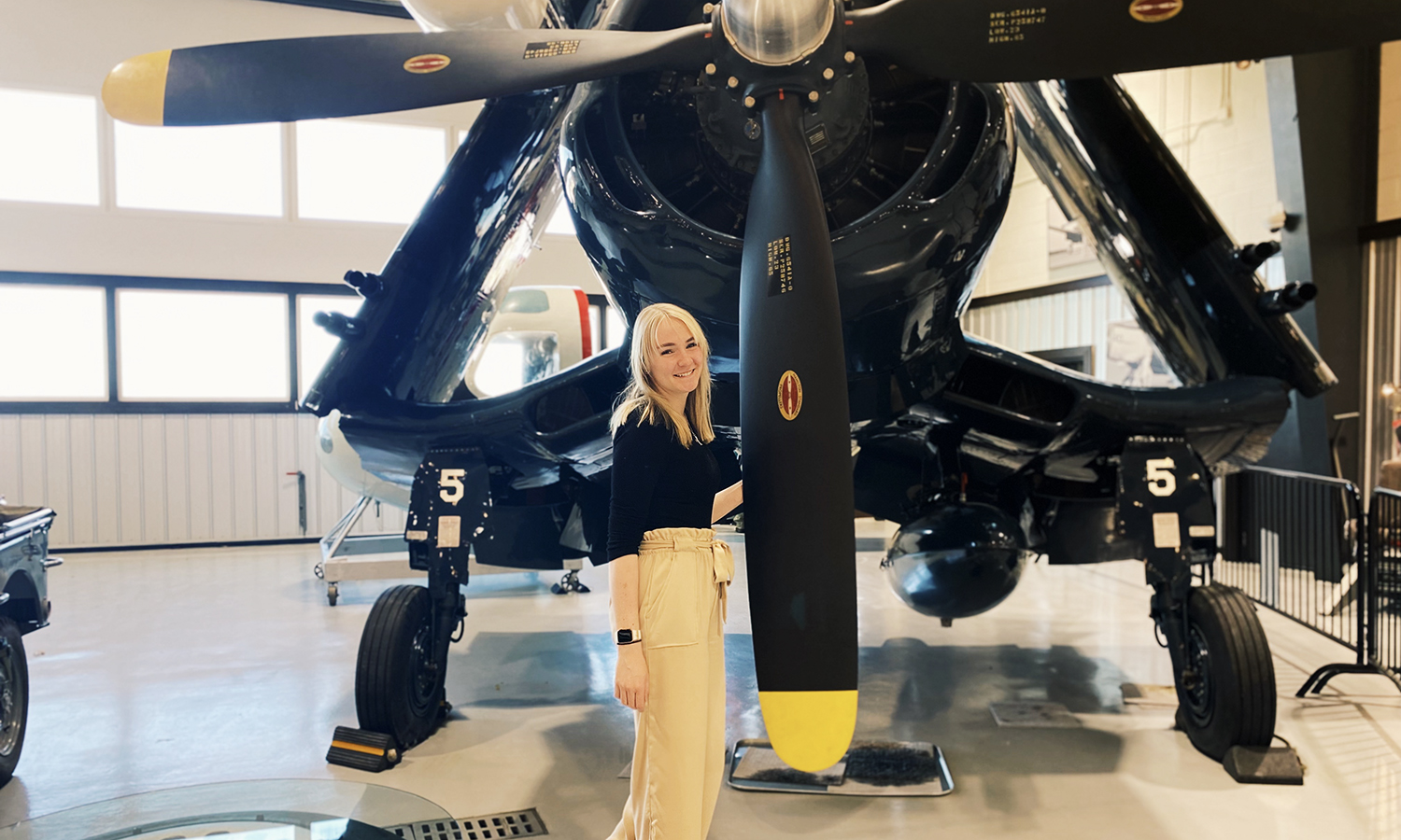 Carr standing in hangar