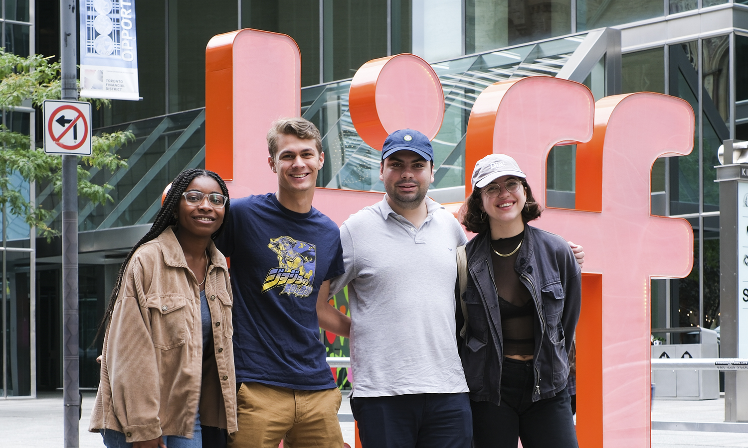 four students in Toronto pose for a photo