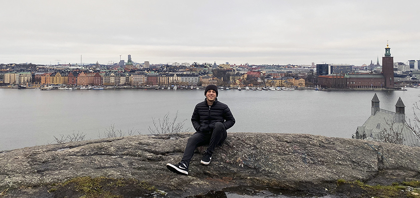 Matthew Nardone ’21 poses in front of the Stockholm, Sweden skyline while studying abroad in Copenhagen.
