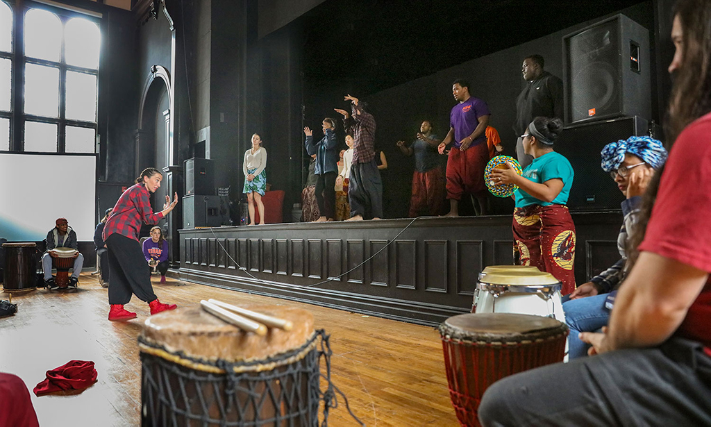 Prof. Kelly Johnson teaches a dance course.