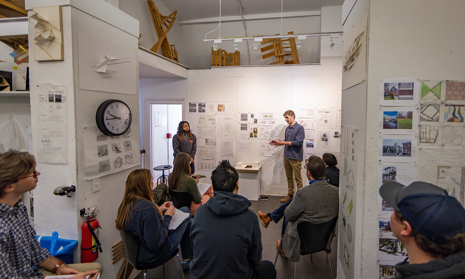During “Architecture Design Studio” with Associate Professor of Art and Architecture Gabriela D’Angelo, Shante Frank ’25 and Cooper Robards ’24 present their redesign of 42 Geneva St. to City of Geneva staff.
