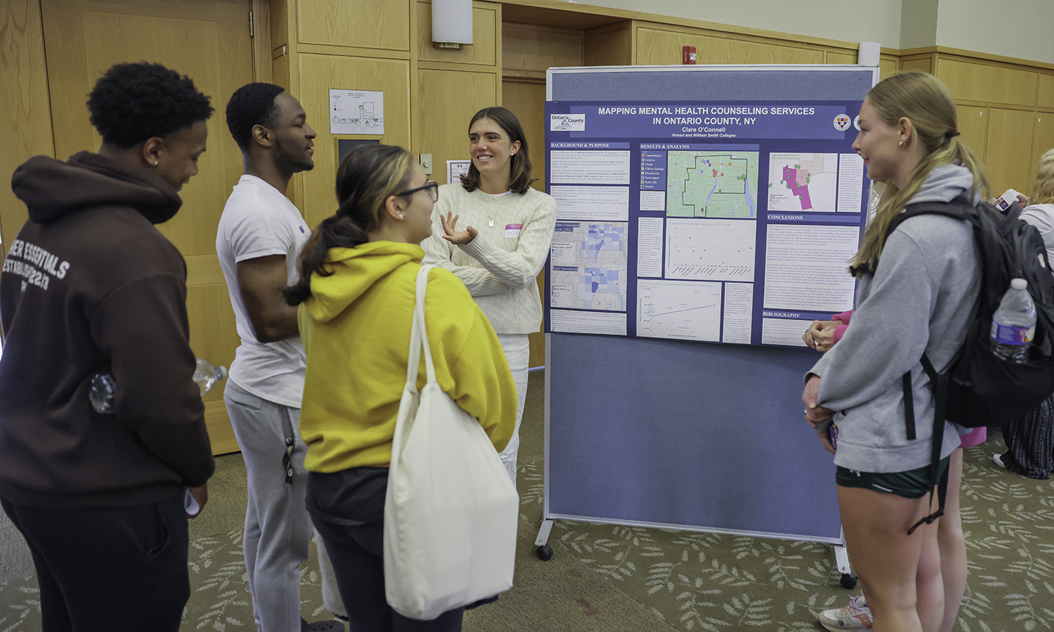 Clare O’Connell ’23 presents her research on Mental Health Counseling Services in Ontario County during the Community Engaged Scholarship Forum.