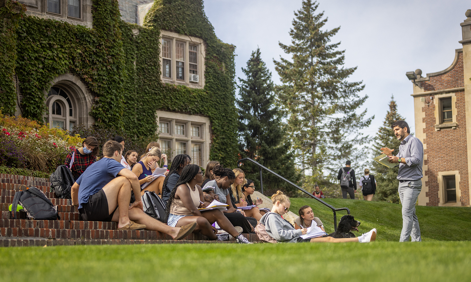 Associate Professor of Sociology Ervin Kosta holds “Classical Sociological Theory” on the steps of Coxe Hall. 