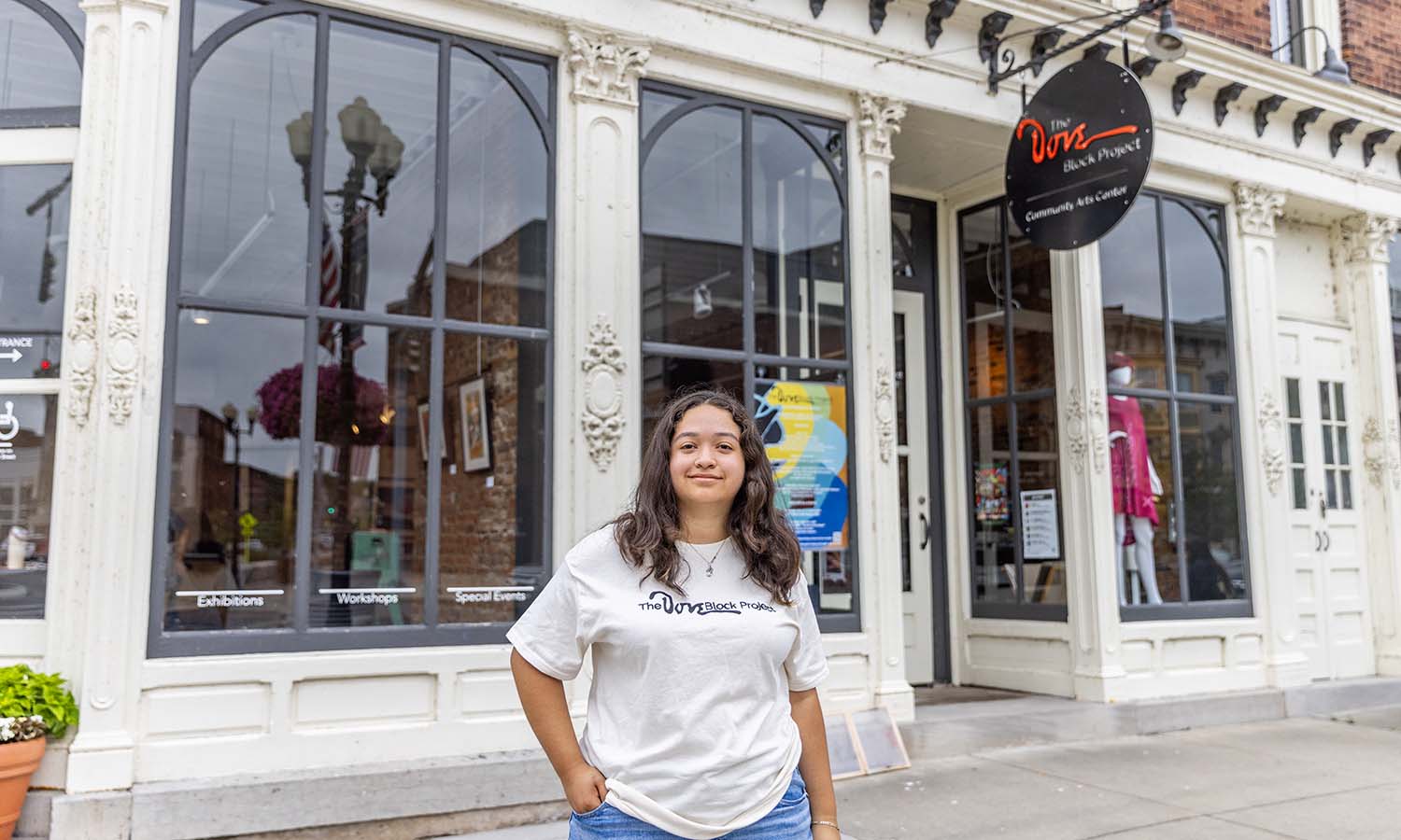 Isabella Ruiz ‘27 stands outside of The Dove Block Project in downtown Geneva, where she is interning this summer. 