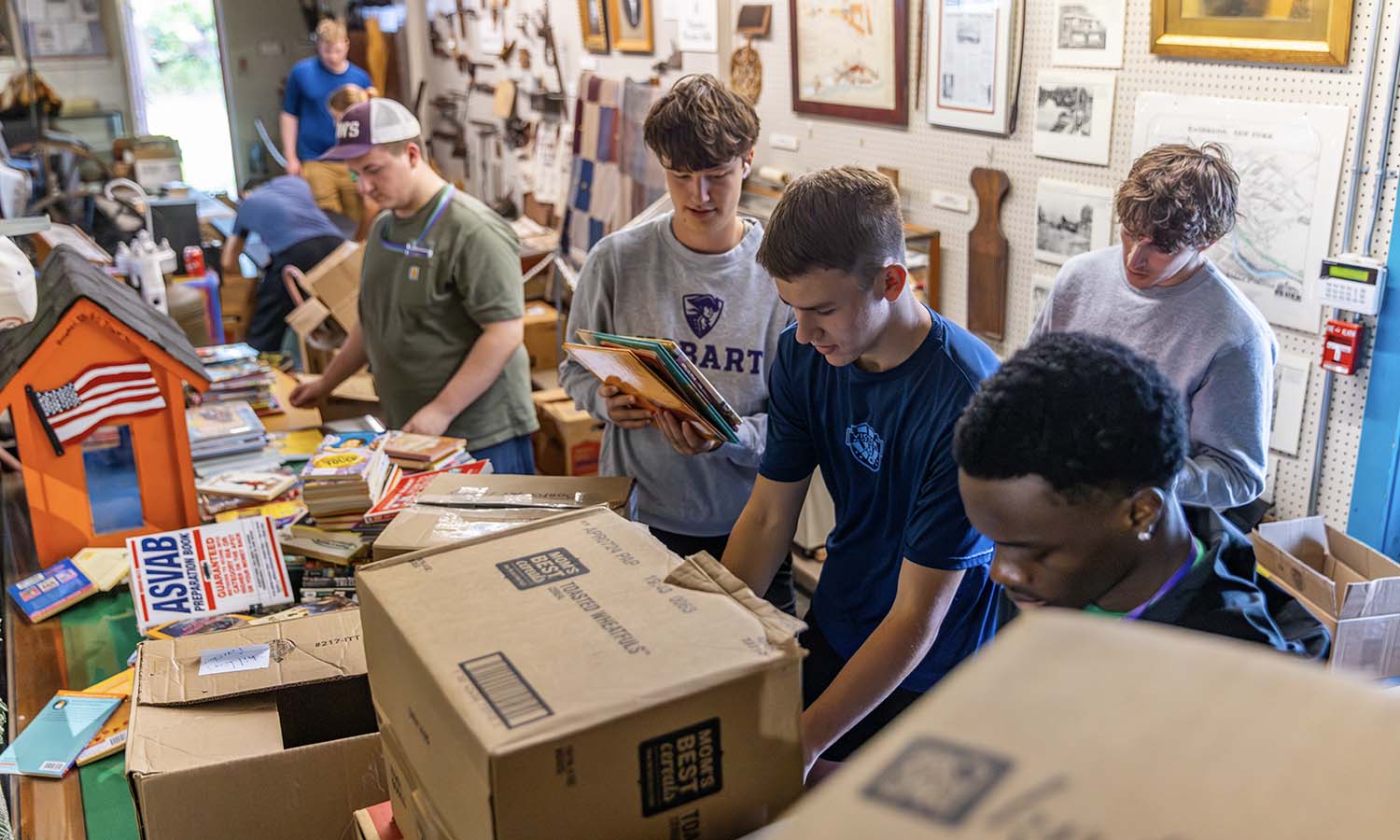 At the Waterloo Library and Historical Society, students organize books. 