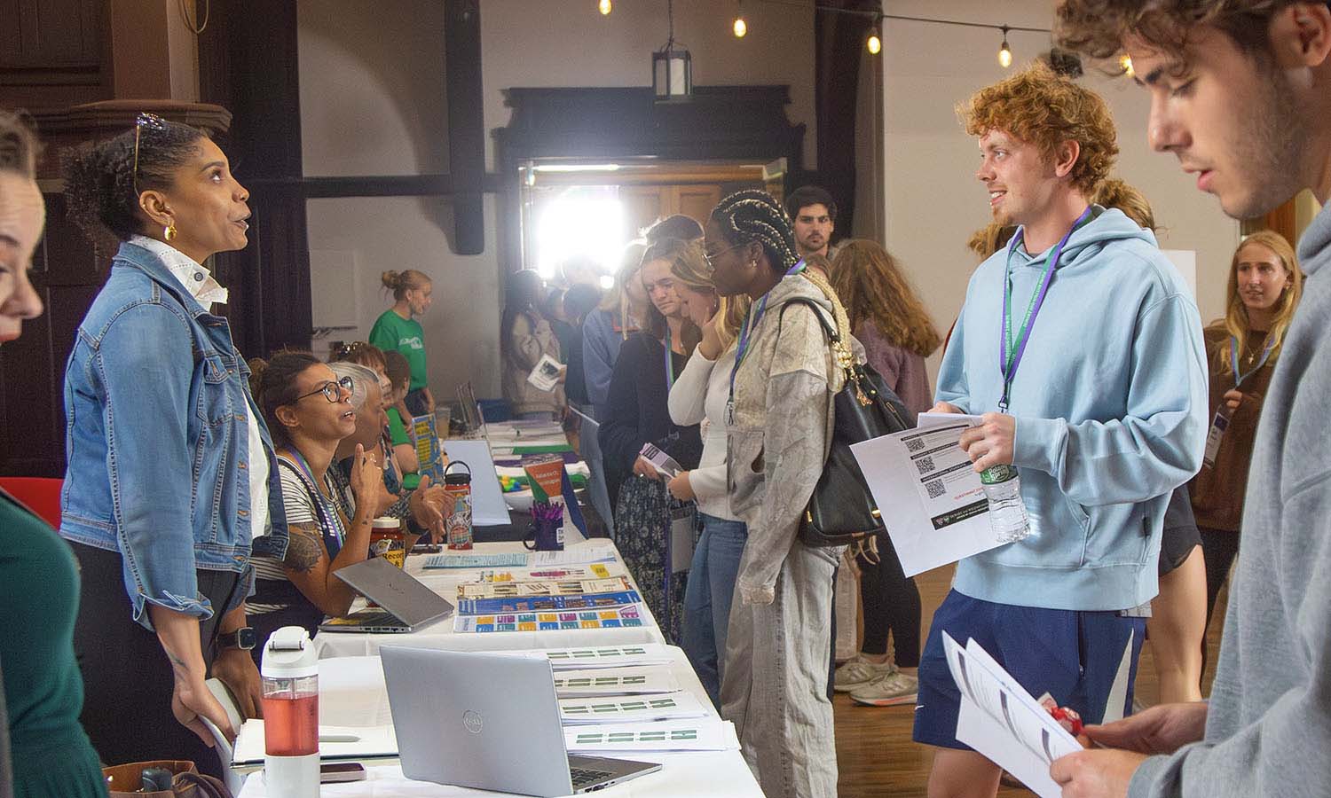 New transfer students attend the resource fair in Bartlett Theatre. 