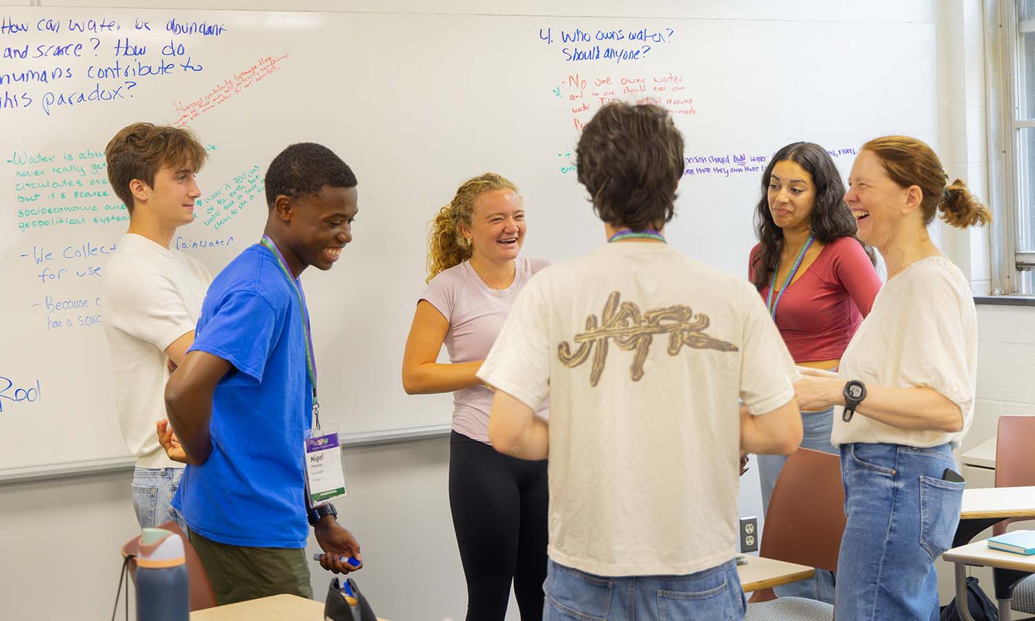 Students share a laugh during “Parched: The Past, Present and Future of Water” with Associate Professor of Geoscience Tara Curtin. 