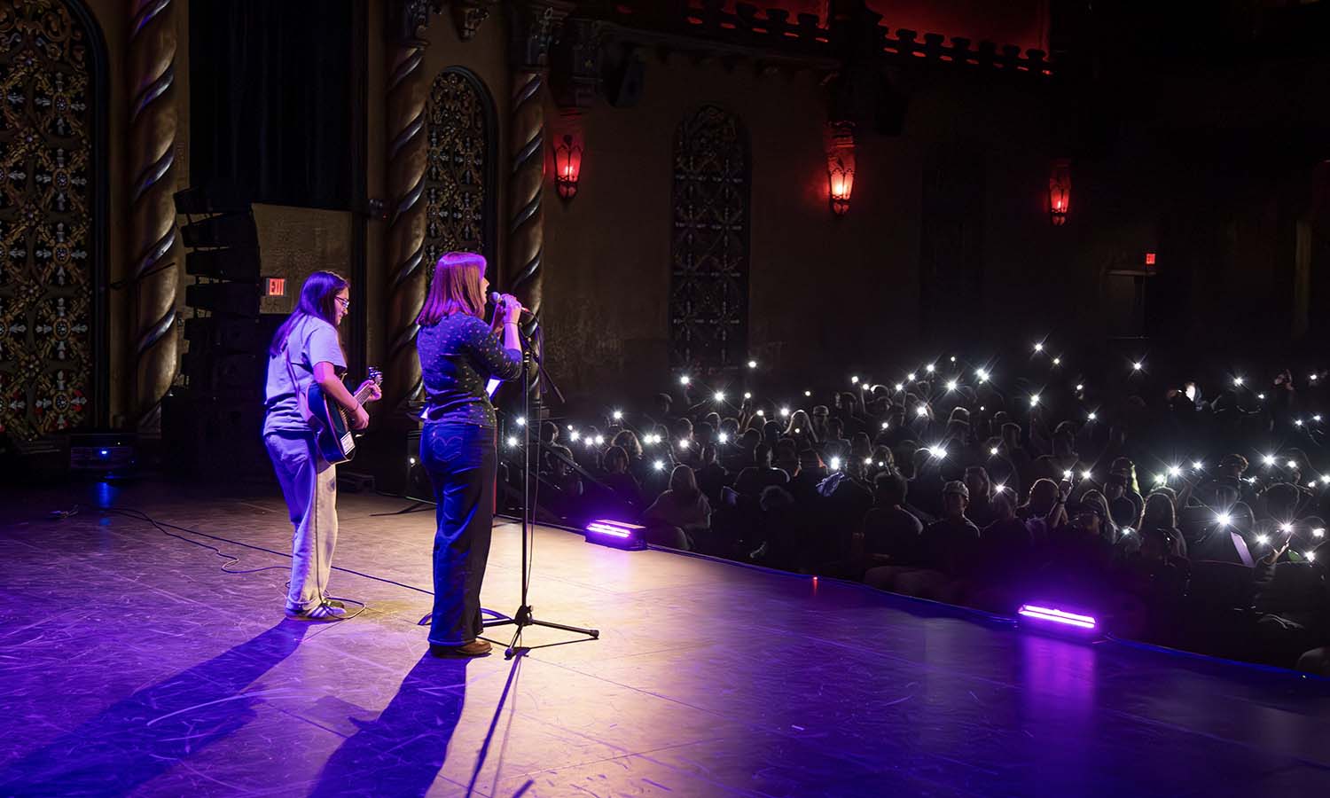 Sophie Mughal ’25 and Maryellen Moore ’28 perform in front of the Class of 2029 during the Variety Show at the Smith Opera House. 