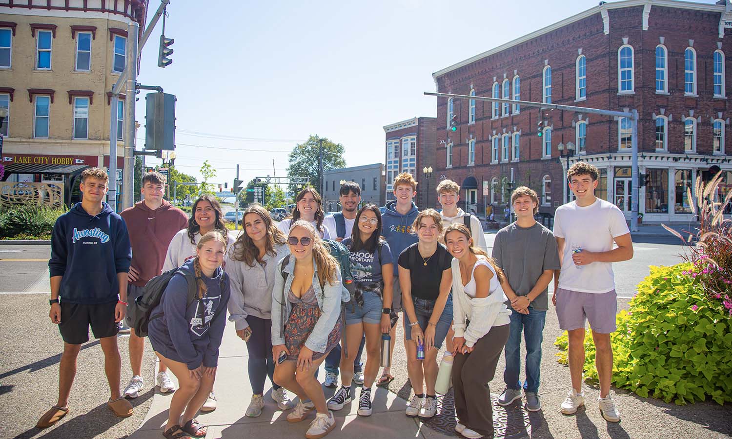 On Sunday, students pose for a photo downtown during the Love Geneva tour. 