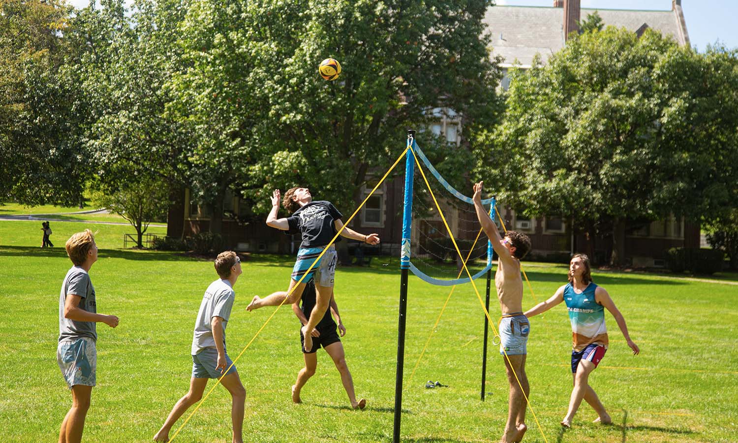 Students play volleyball on Smith Lawn. 