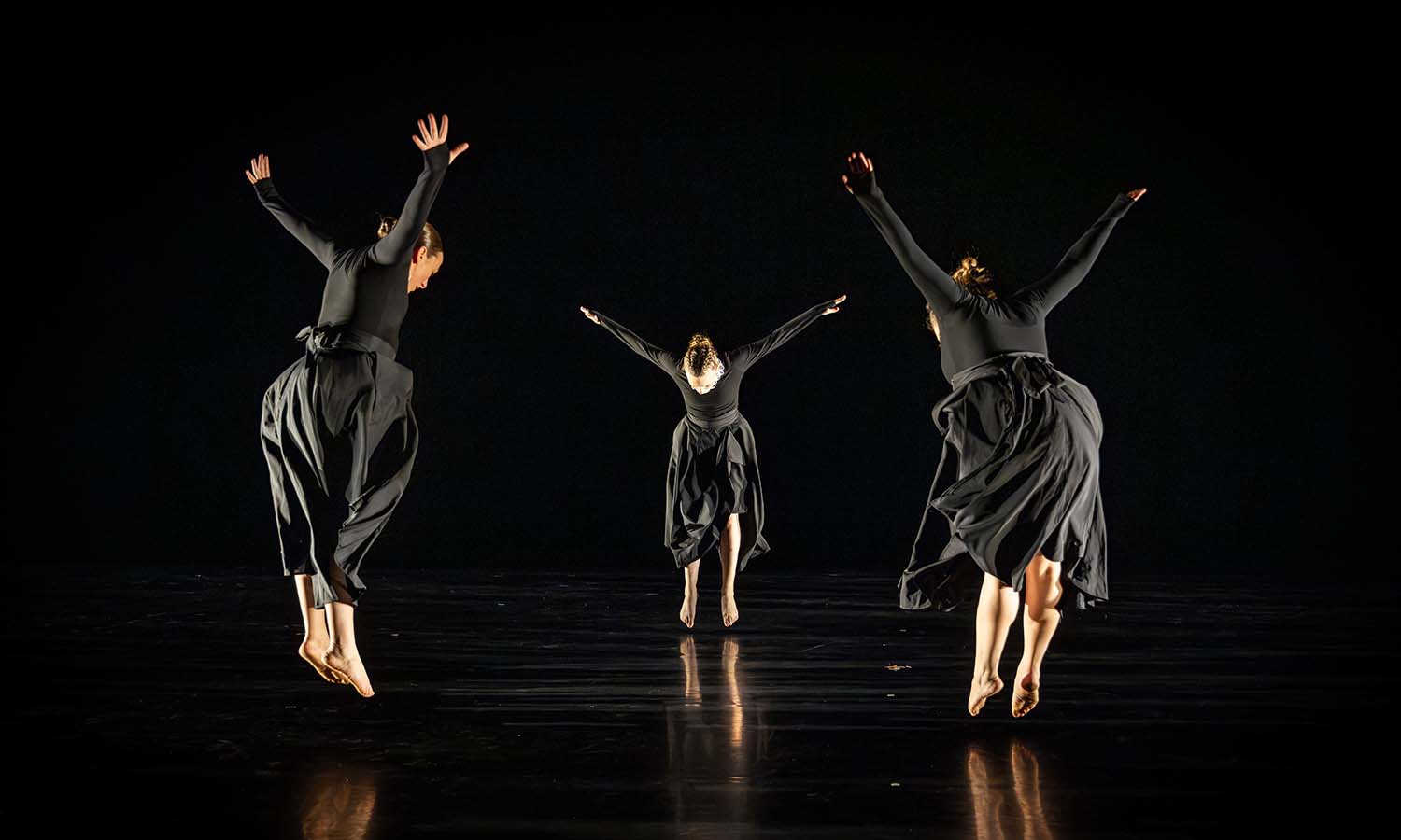 Associate Professor of Dance and Movement Studies Kelly Johnson, Hannah Bixby ’23 and Rochester-based artist Caitlin Mahon perform Johnson’s work “Price of Eggs” during the Faculty Dance Concert. 