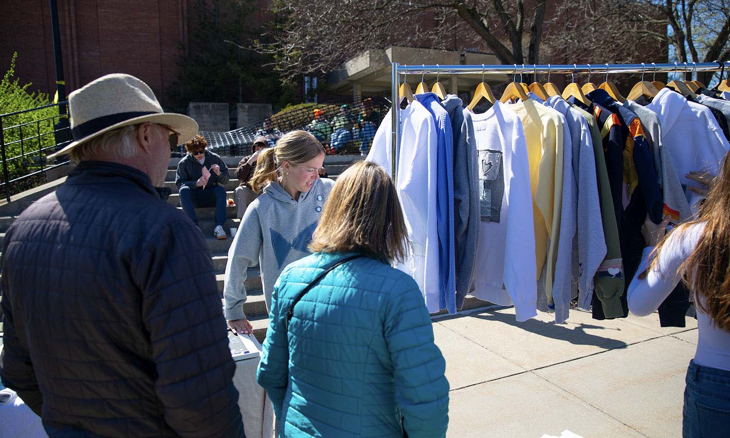 Founder of Em’s Threads and winner of the 2024 Pitch Competition Emily Rourke ’24 sells clothing at the return of the Folk Fest. 