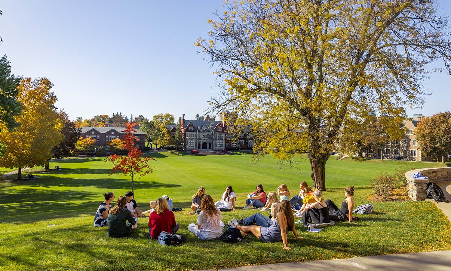 Associate Professor of Educational Studies Diana Baker hosts class on the Quad. 