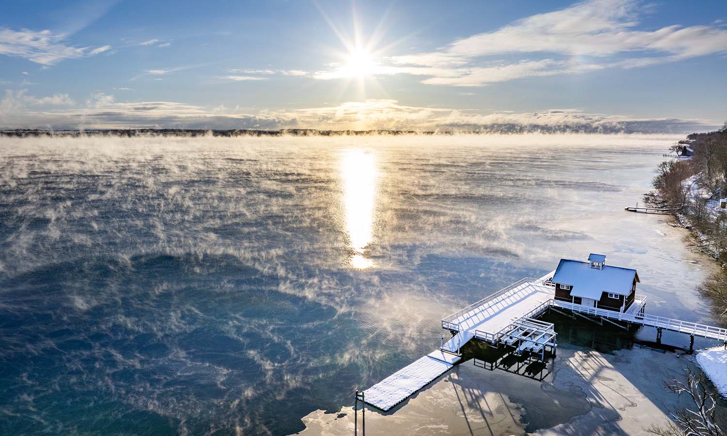 Steam fog rises over Seneca Lake. 