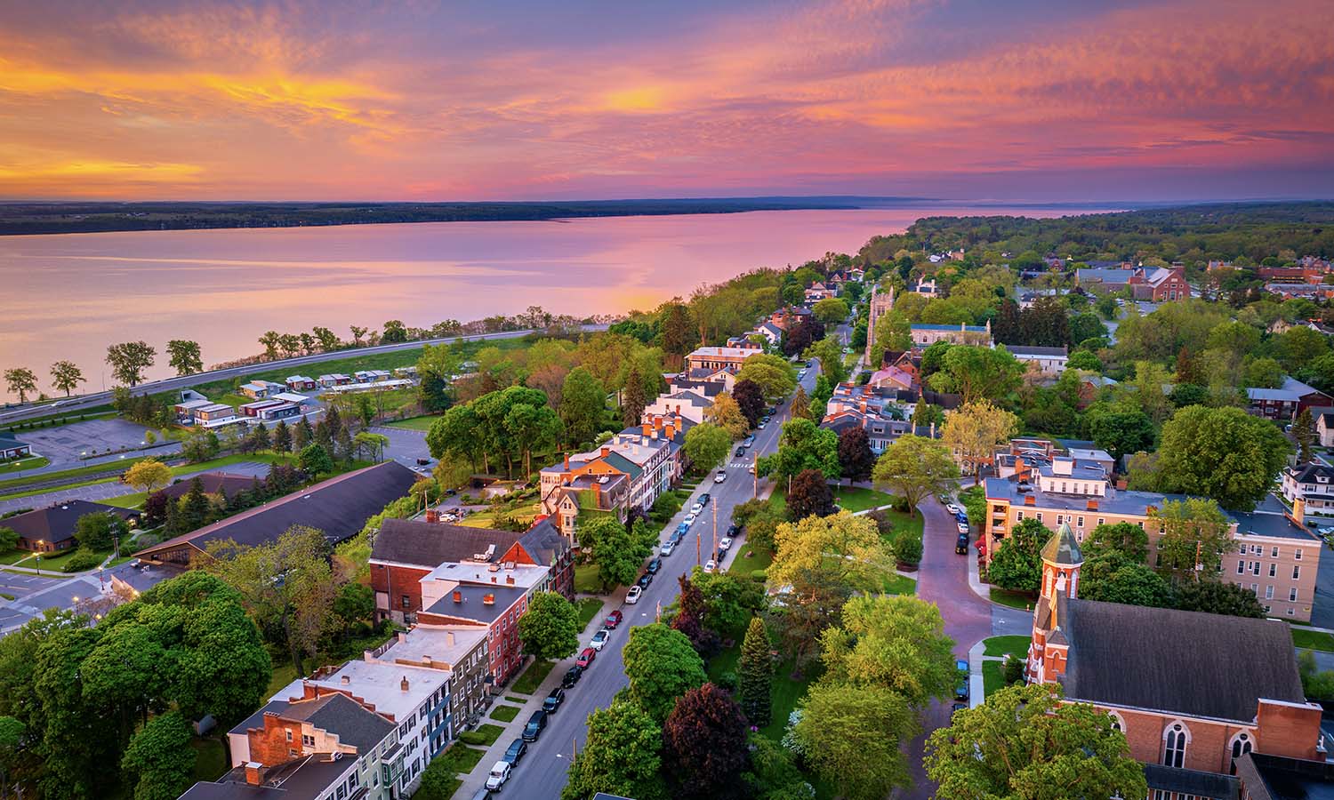 The sunrise above the iconic row houses on South Main Street in Geneva. 