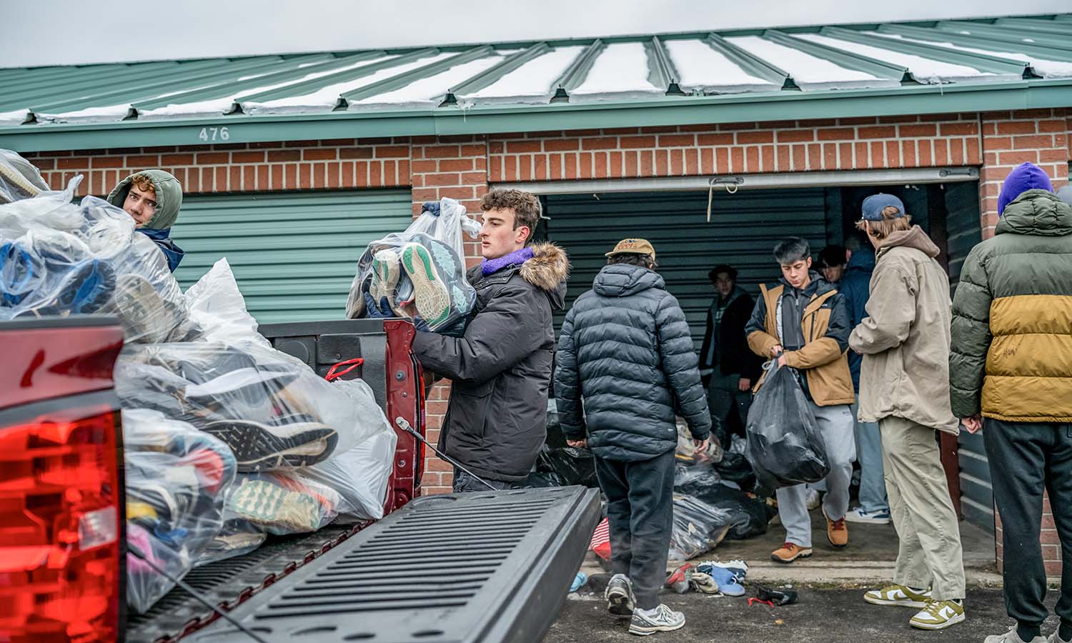 The Hobart volleyball team helps the nonprofit organization Soles4souls transport more than 15,000 pairs of shoes that were collected for children in need. 