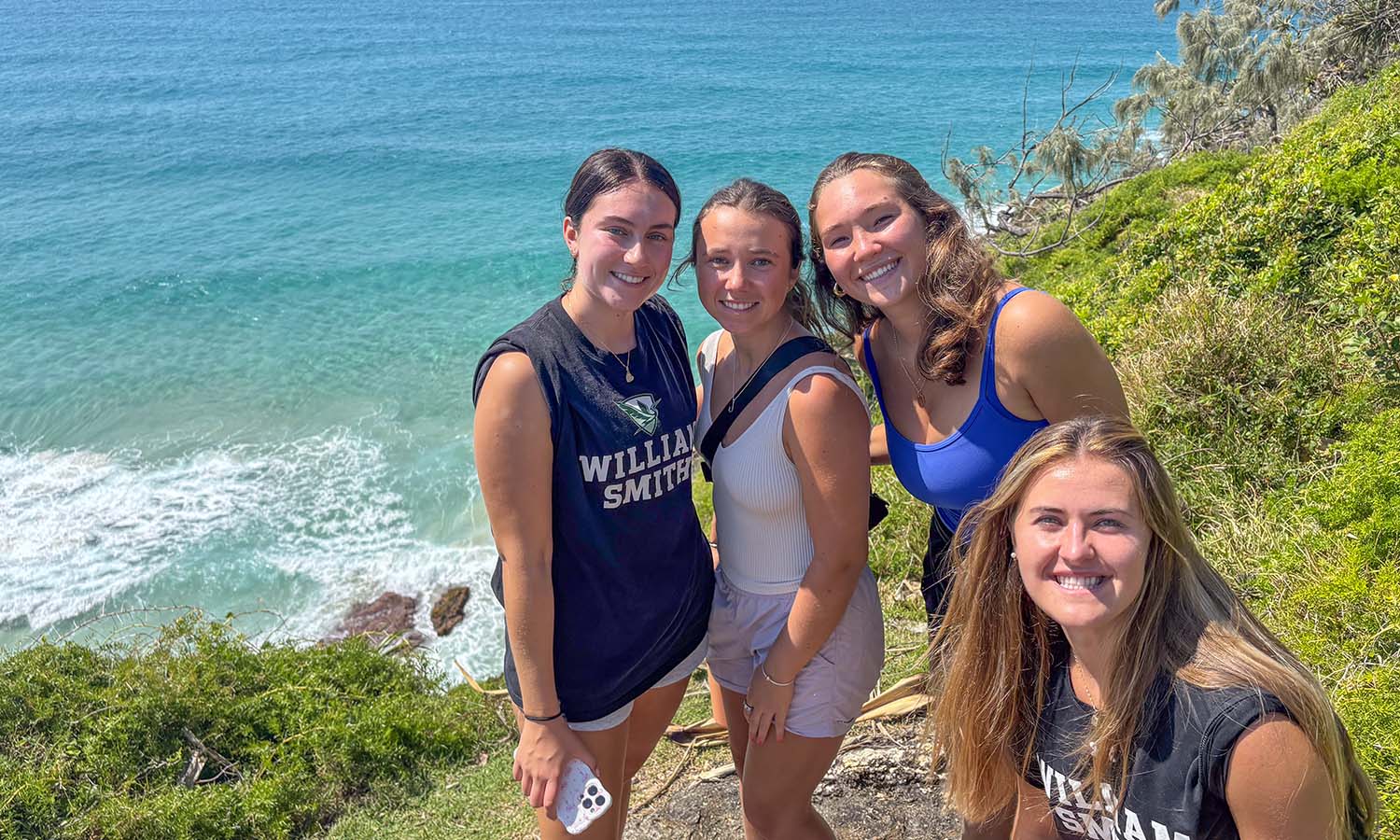 While studying abroad, Grace O’Connor ’27, Katie Ingle ’27, Mia Falco ’27 and Kelly Malone ’27 pose for a photo at Point Lookout in Queensland, Australia. 
