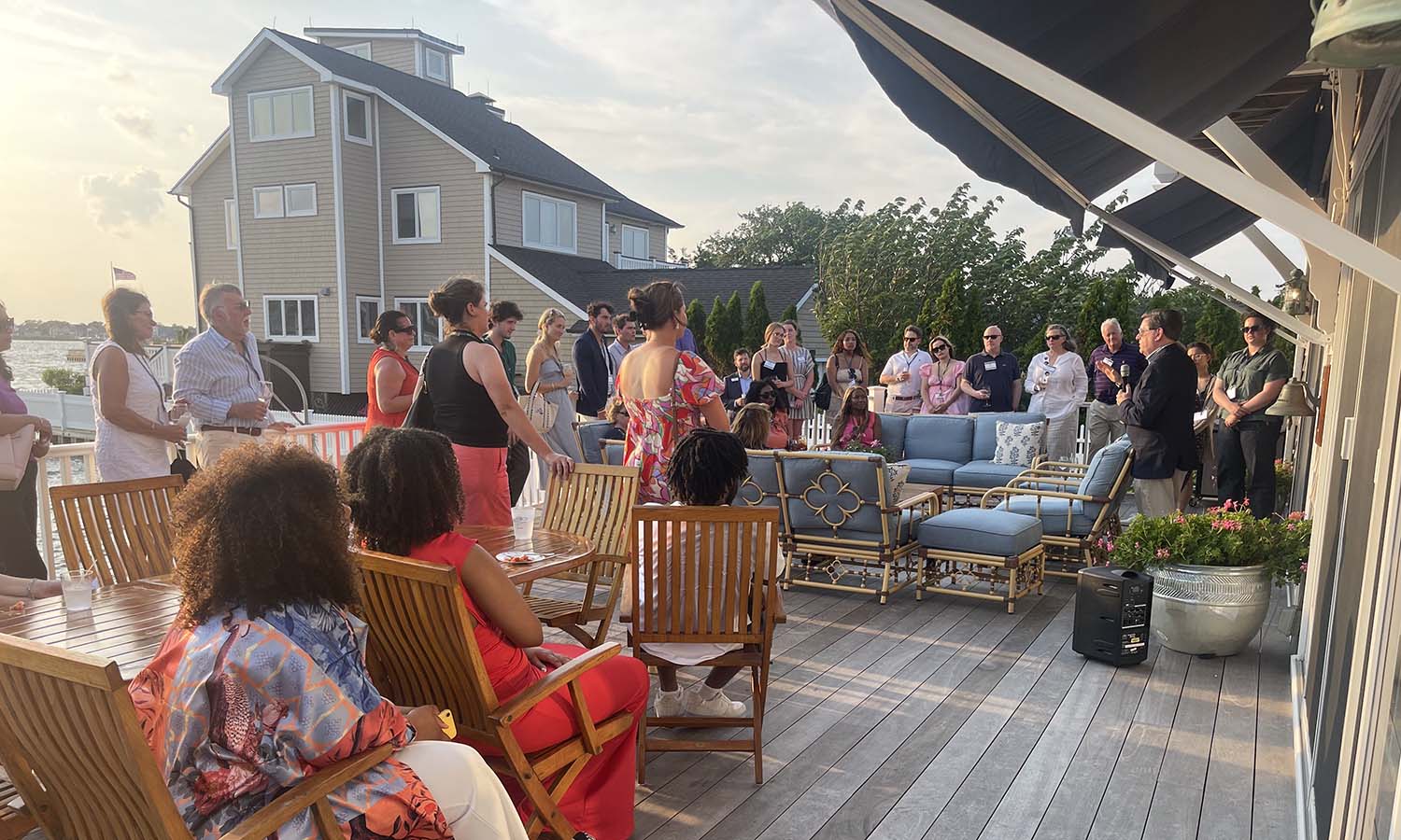 President Mark D. Gearan welcomes alumni at the kickoff event for the HWS Summer Series celebrating “Further Together: the Campaign for our Third Century” hosted by Pamela Lucas Rew ‘81 and Jane Rew Buckley '14. 