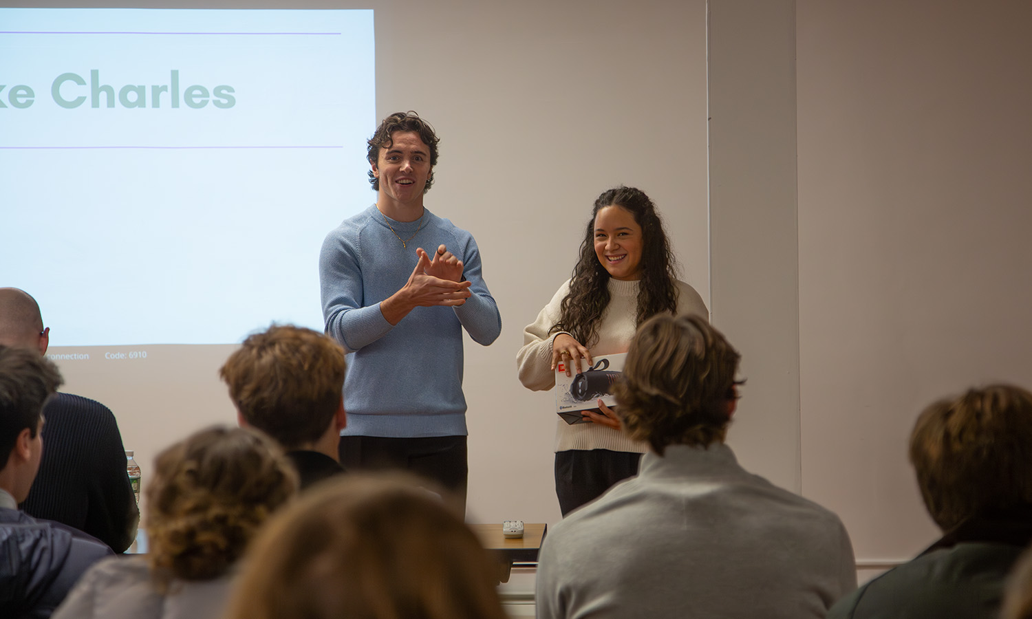 Cohen ’67 Bozzuto Center Intern Khalil Fontana '26 congratulates Fiorella Covo Marrugo '29 on winning first place in the Elevator Pitch competition at The Bozzuto Center for Entrepreneurship.  