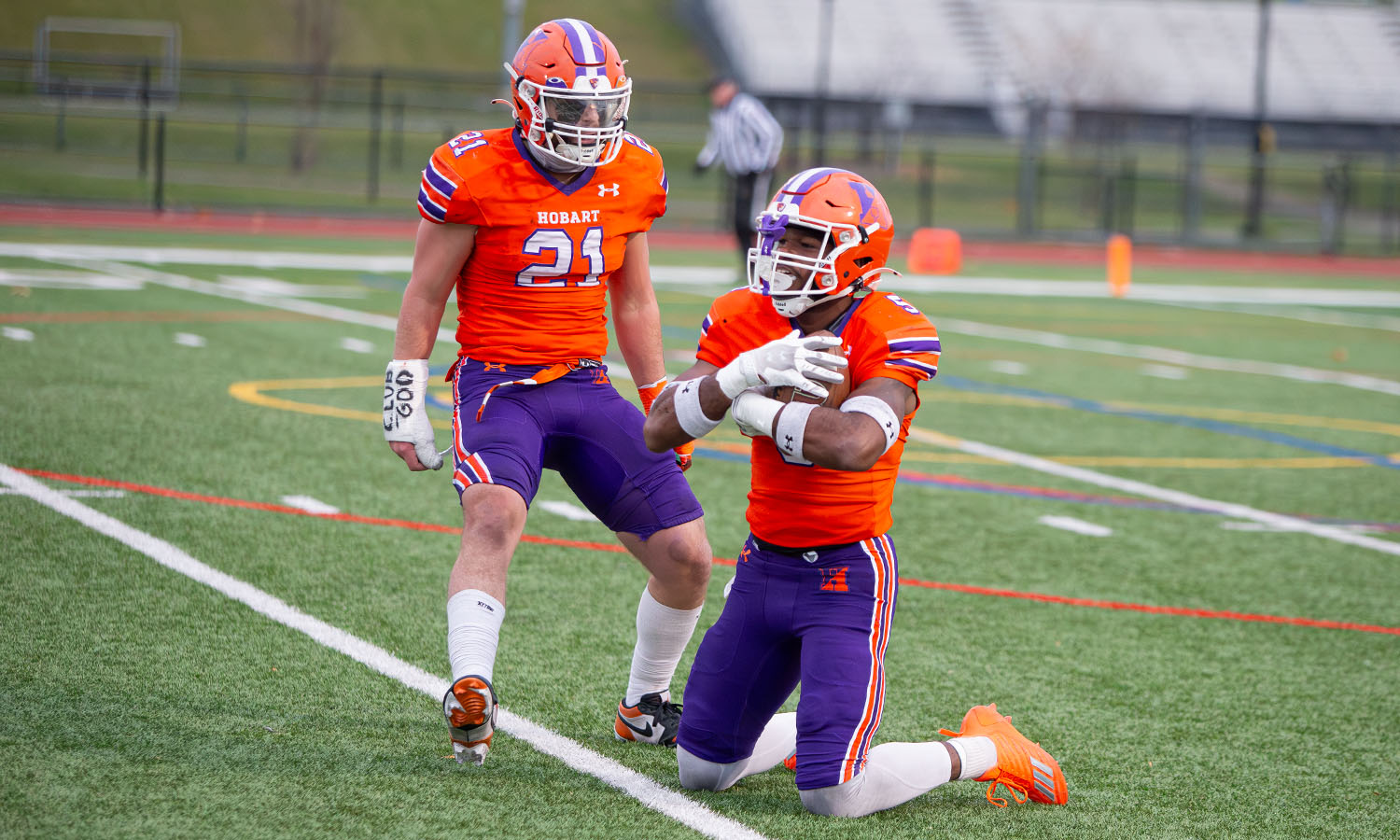 Linebacker Mike McGhee '26 and defensive back Zeshan Dixon '27 celebrate an interception during the Statesmen's 35-9 victory over Buffalo State. Next up for the Hobart football team is a date with SUNY Maritime College in the 2025 ECAC James Lynah Bowl. 