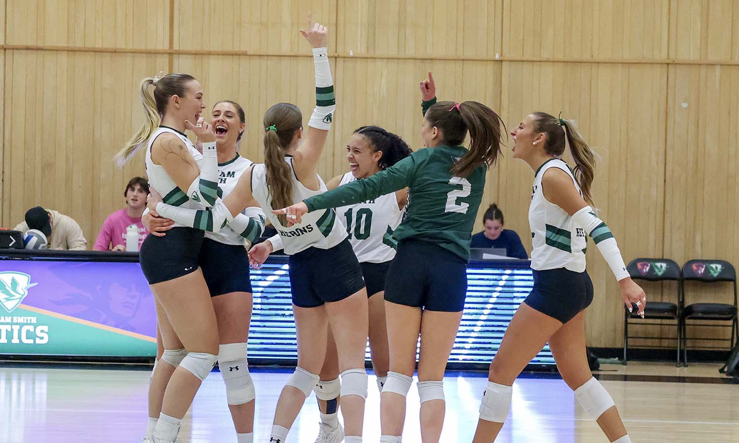 The third-seeded William Smith volleyball team celebrates a point as they defeated sixth-seeded Clarkson in the first round of the Liberty League Tournament on Tuesday. 
