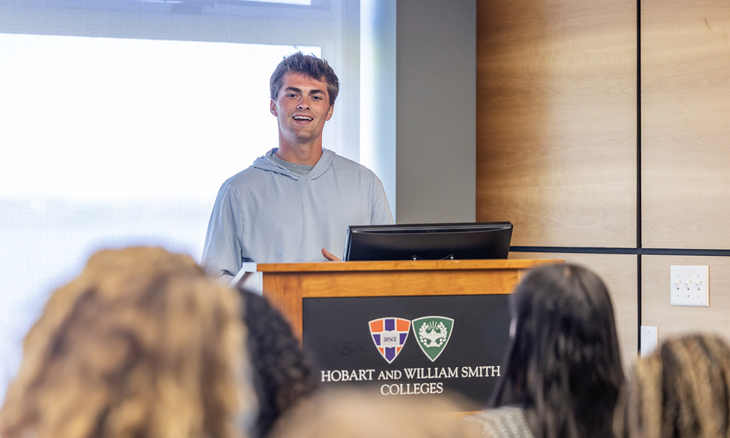Noah Fischer '27 presents during "Public Speaking" with Katie Flowers, the executive director of the Center for Community Engagement and Service Learning and the Centennial Center for Leadership.  