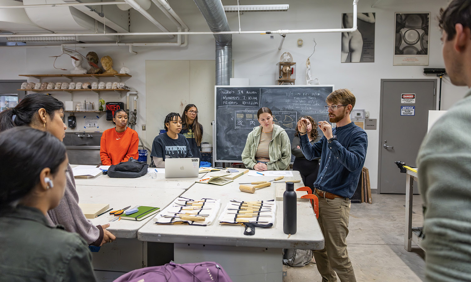 Visiting Assistant Professor of Art and Architecture Patrick Kana demonstrates sculpting techniques during "Intro to Sculpture." 