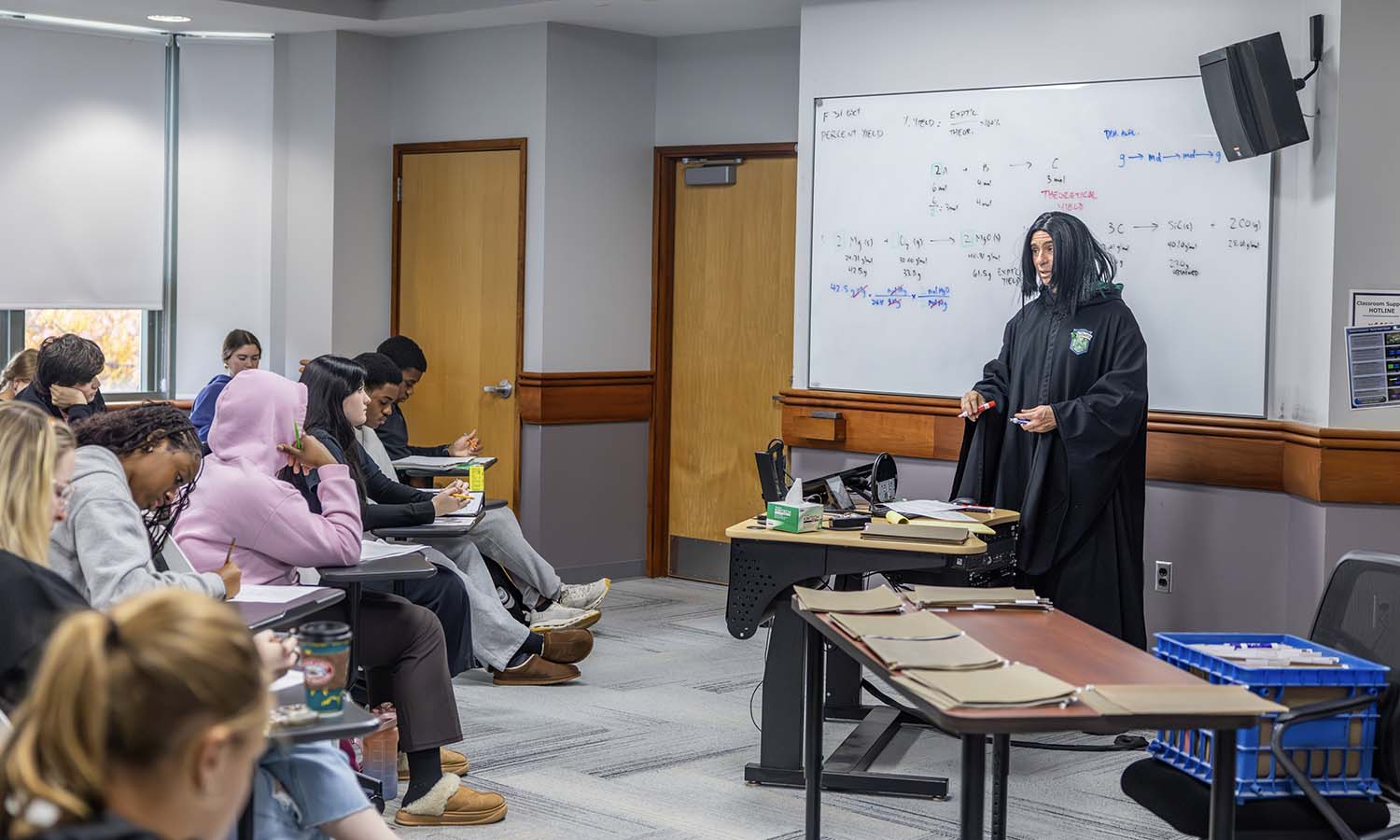 Dressed as Severus Snape from Harry Potter, Professor of Chemistry Justin Miller teaches “Intro to General Chemistry.” 