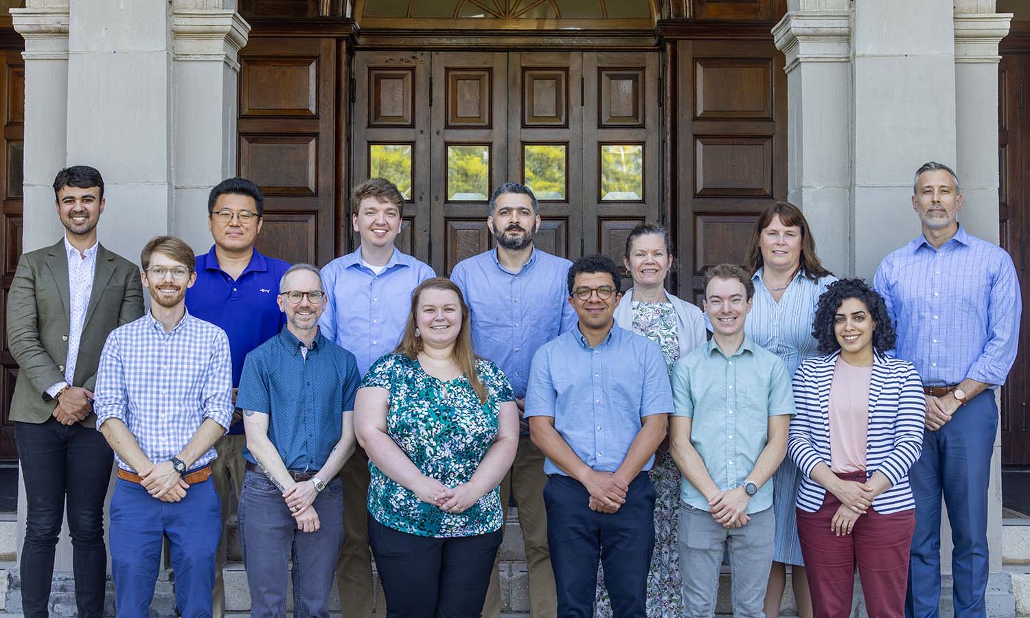 New faculty gather for a photo, including (front row) Patrick Kana ‘12 (art and architecture), Joshua Cole-Kurz (gender, sexuality, & intersectional justice), Kylie Smith (sociology), Yuri Gama (history), Bridger Herman (mathematics and computer science), Alaa Murad (Asian studies); (back row) André Nascimento (Fisher Center), Do Hyoung Kim (environmental studies), Zachariah Barfield (physics), Harun Ercan (sociology), Sara Greenleaf (library), Sarah O’Shea (library) and Jason Hoppe (writing colleagues). 