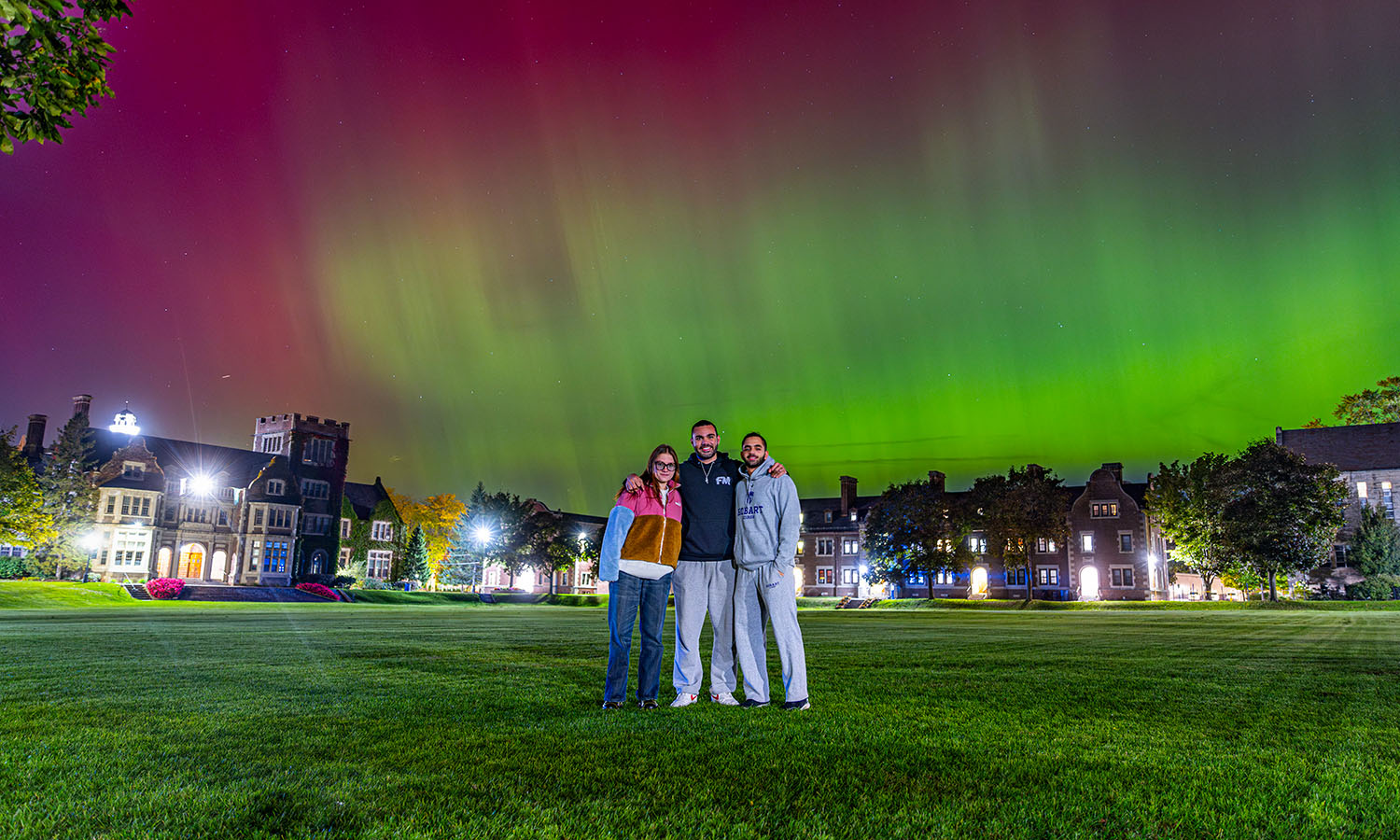 In This Week in Photos, we reflect on the 2024-2025 academic year. Here, Barbora Mickute ’27, Mohammad Yassin ’25 and Hussein Labib ’25 pose for a photo on the Quad under an incredible showing of the Northern Lights.