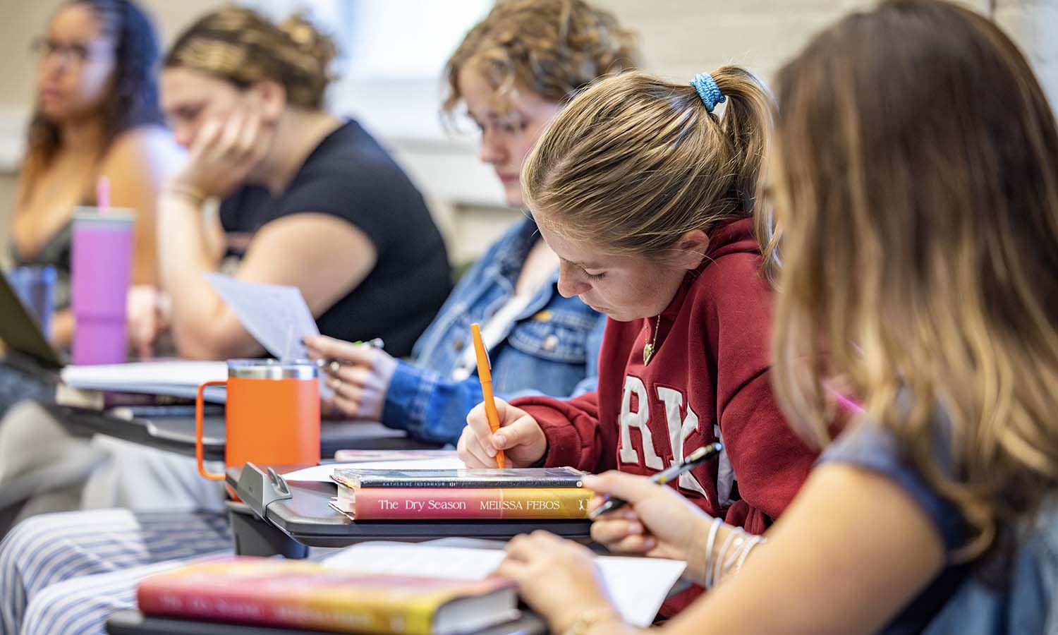 Elle Oberfield ’27 takes notes during “Small Press Book Publishing” with Associate Professor of Writing and Rhetoric and English and Creative Writing Geoffrey Babbitt. 