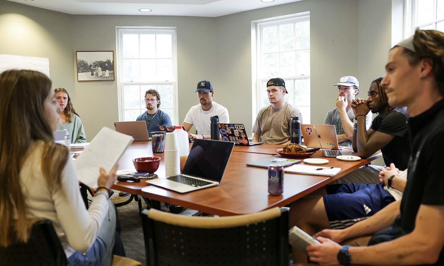 Associate Director of the Center for Community Engagement and Service Learning Peter Budmen ’15, MAT ’16 leads a discussion during “Leadership Theory I.” 