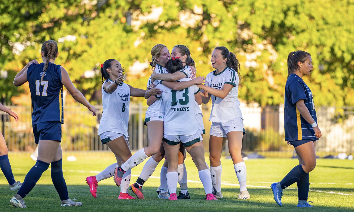 The Herons celebrate Ruth Hotaling’s ’26 first half goal against Ithaca. Hotaling leads the Liberty League with seven goals and 15 points. 