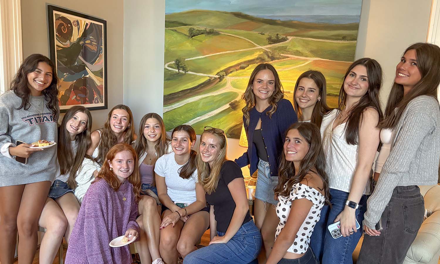 During the President’s Open House hosted by President Mark Gearan and Mary Herlihy Gearan, students gather for a photo on Friday evening. 