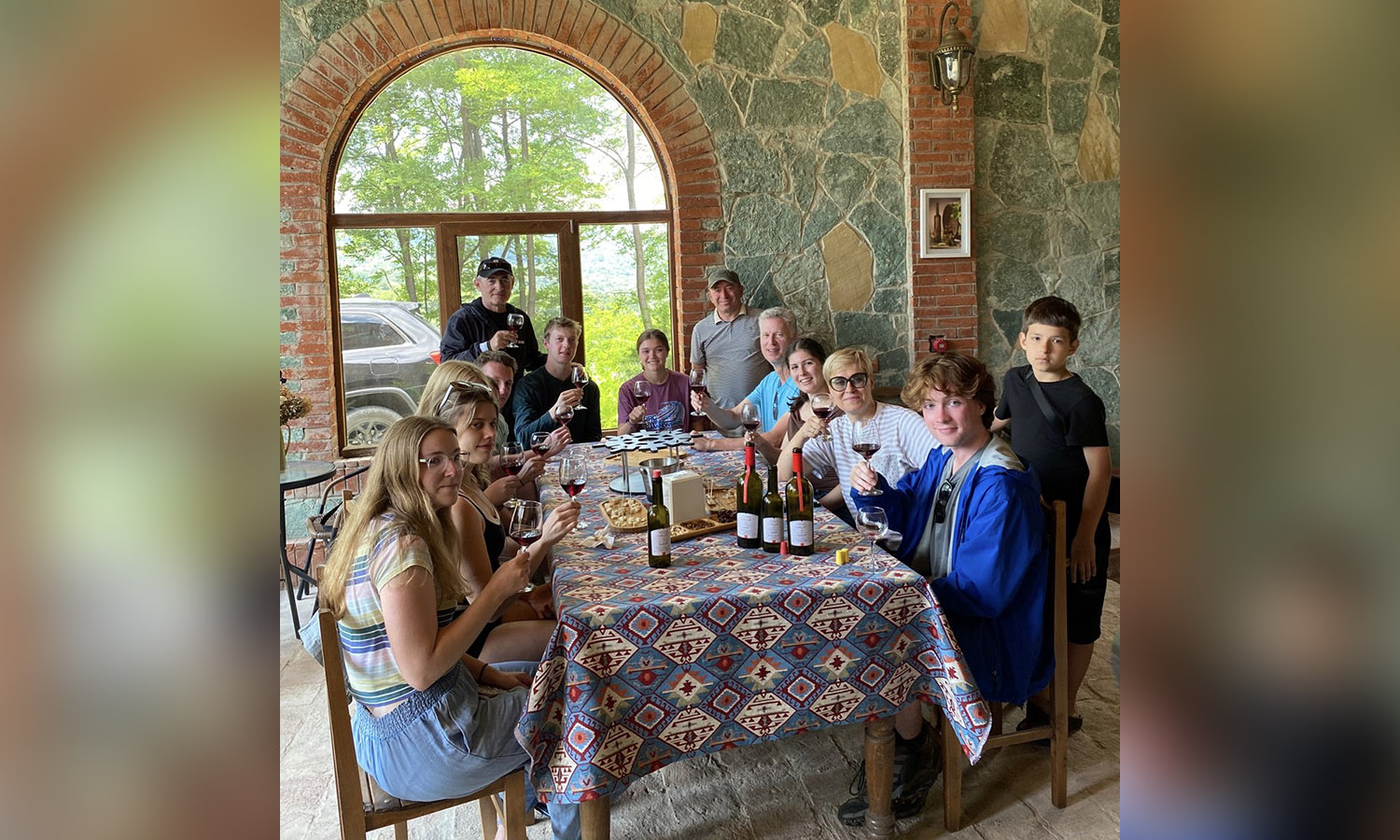 In the Racha region of Georgia, students visit the city of Ambrolauri and learn about winemaking while doing a tasting. 