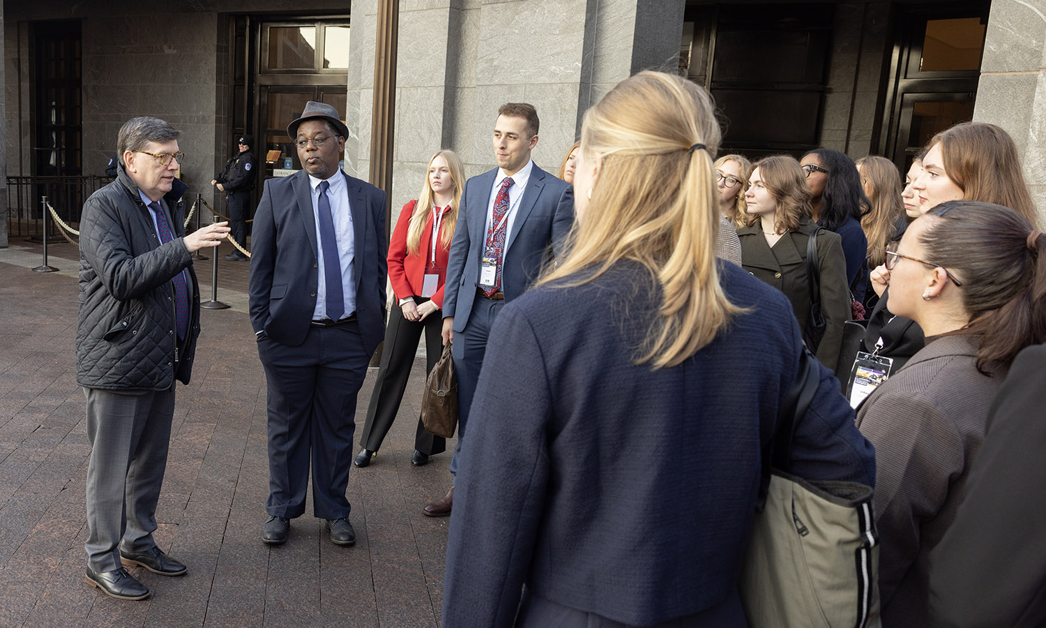 President Mark D. Gearan chats with Associate Professor of Politics DeWayne Lucas and students while touring the United States Capitol Building as part of the annual Day on the Hill Career Trek. 