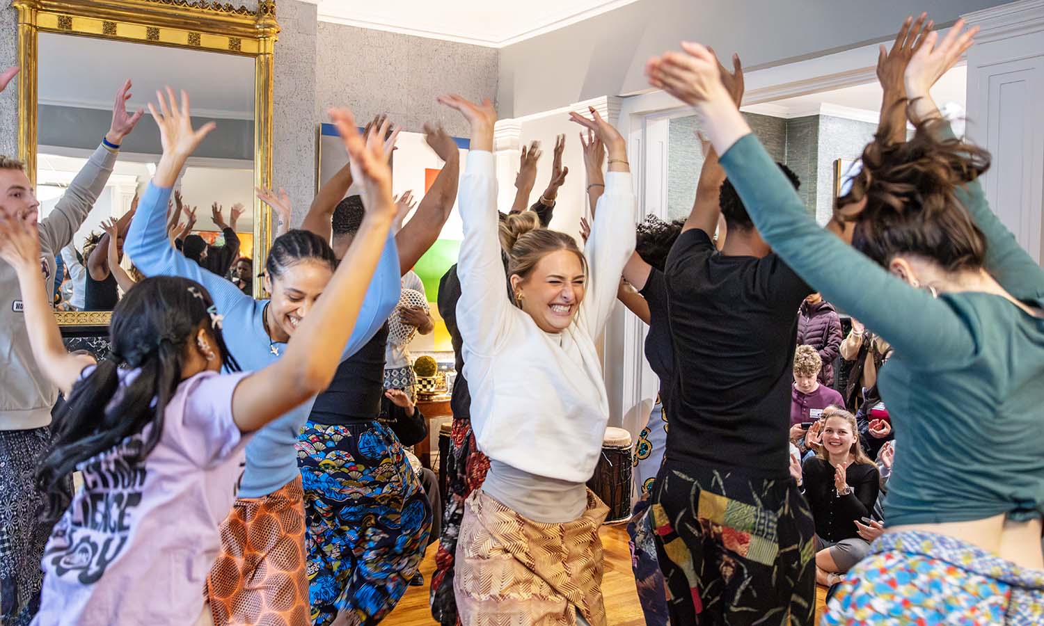 At the weekly President’s Open House, students in “Introduction to Dances of the African Diaspora” with Associate Professor of Dance Kelly Johnson perform in the living room. 