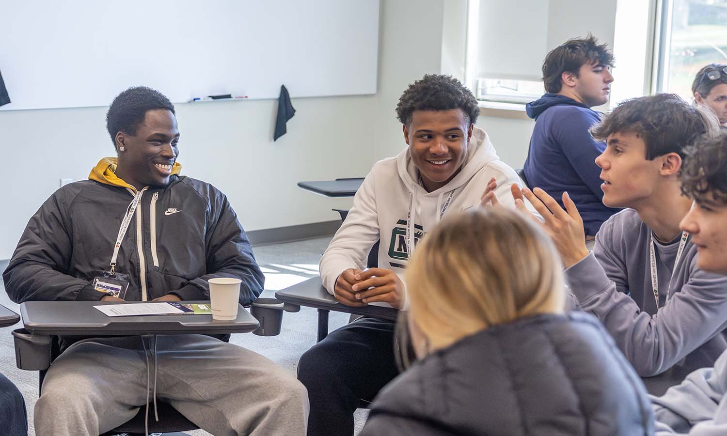 During a sample class with Associate Professor of Business Management and Entrepreneurship Craig Talmage, students brainstorm the fundamentals of a what makes a company viable. 
