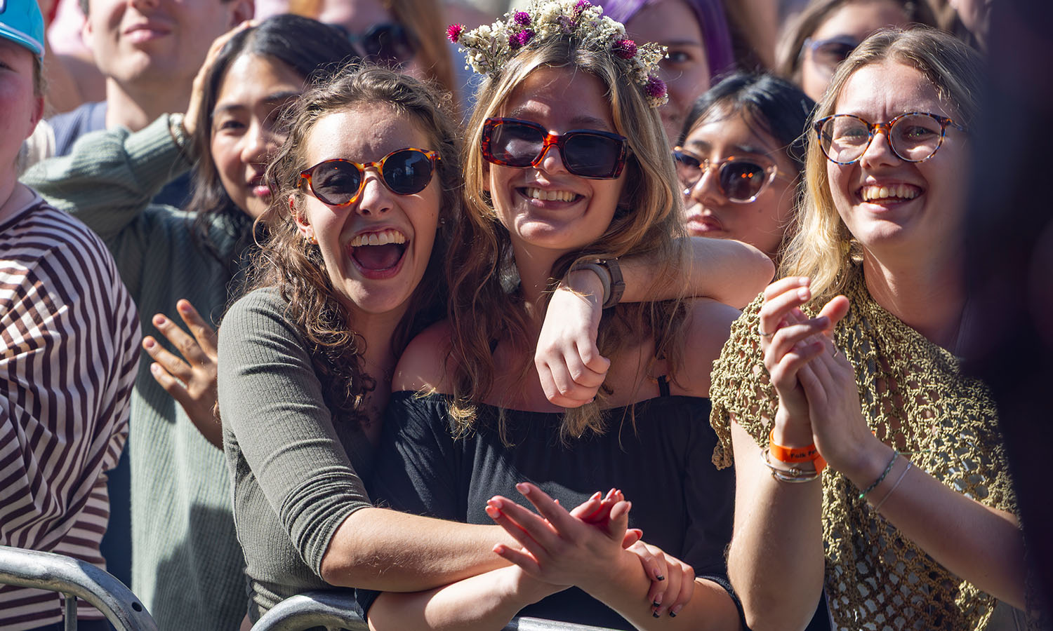 Abbie Ellison '26 and Elle Grillo '26 are caught up in the excitement of Folk Fest. 