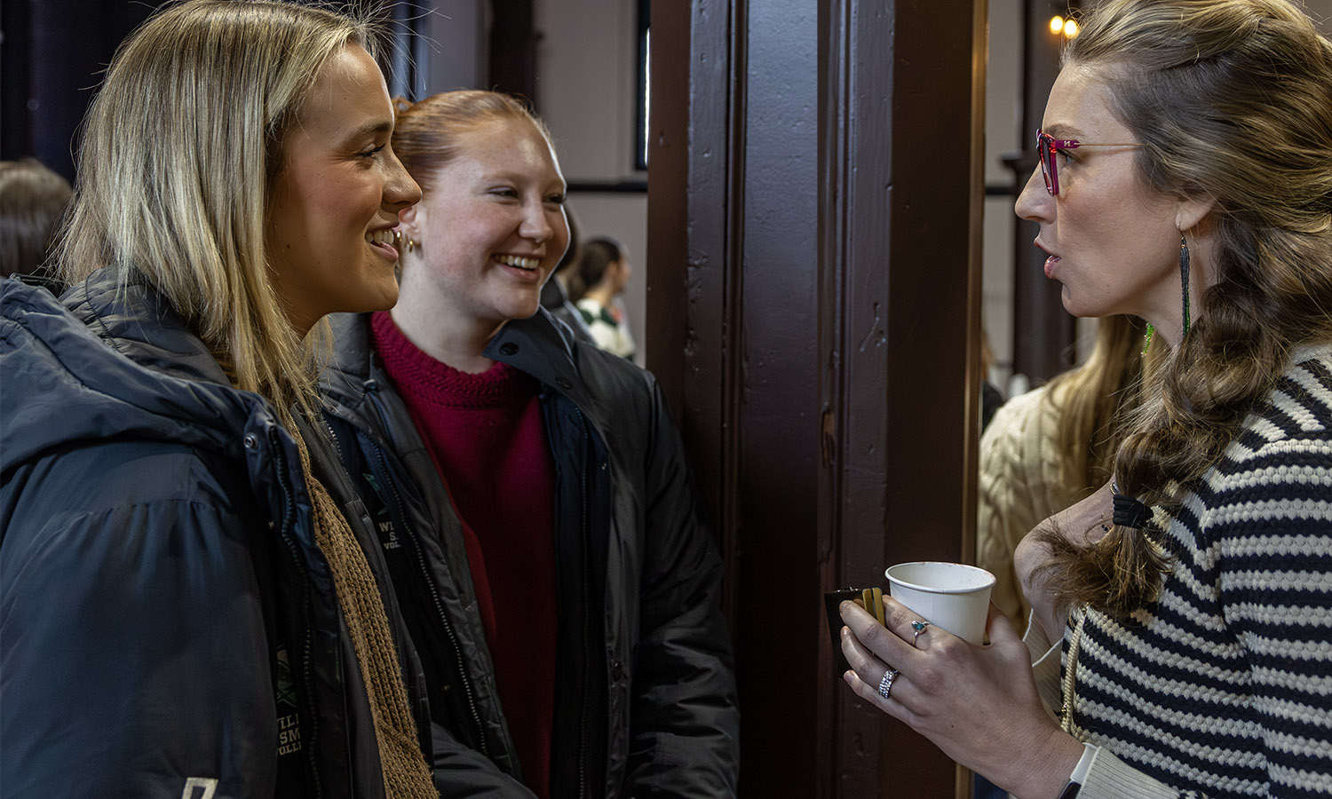 Lily Wittgraefe ’29 and Madilyn Kresl ’29 chat with Financial Advisor at Morgan Stanley Michelle Steigerwald Raymond ’04 during the Herons Career Networking event with members of the Heron Society Board of Directors. 
