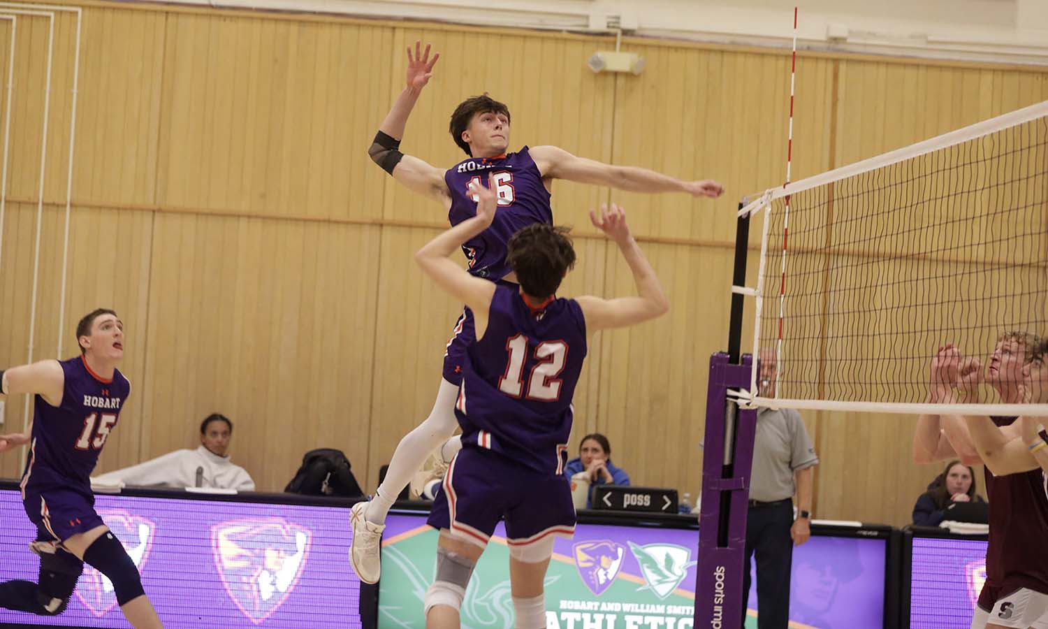 Zack Farren '27 sets up Kian Kischke '28 for the kill as the Hobart volleyball team takes on Springfield.  