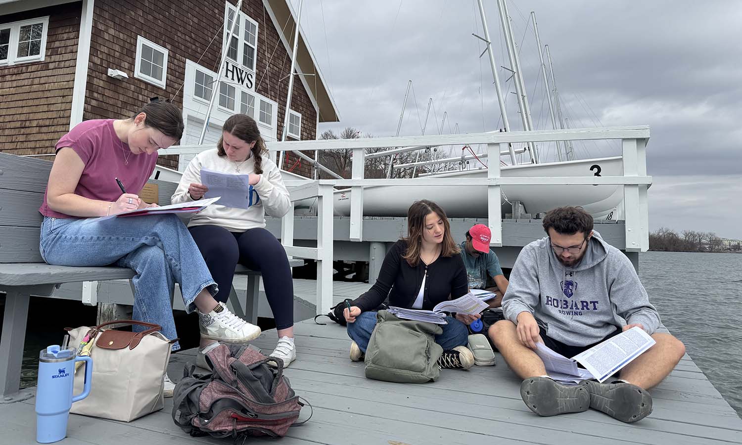 At Bozzuto Boathouse, students in Professor of Biology Meghan Brown’s class “Colonization Biology” discuss the role of evolution in the colonization of plants and mollusks. 