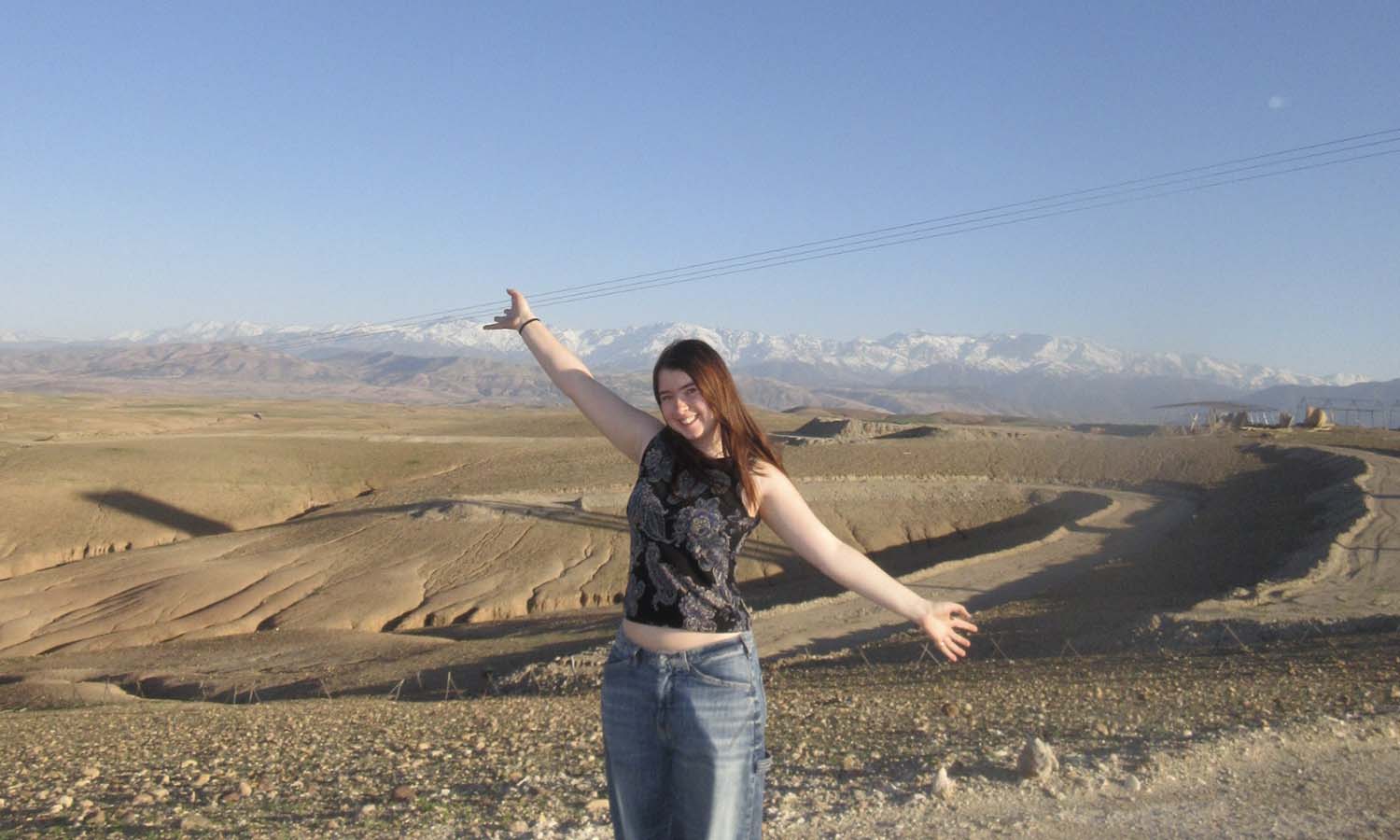 Olivia Weidele ‘28 poses for a photo during a trip to the Afagay Desert while visiting Marrakech, Morocco during her semester abroad. 